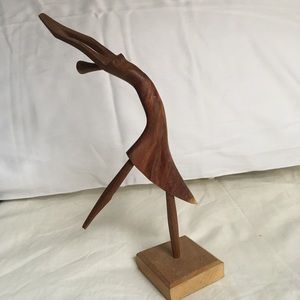 Wooden dancer sculpture